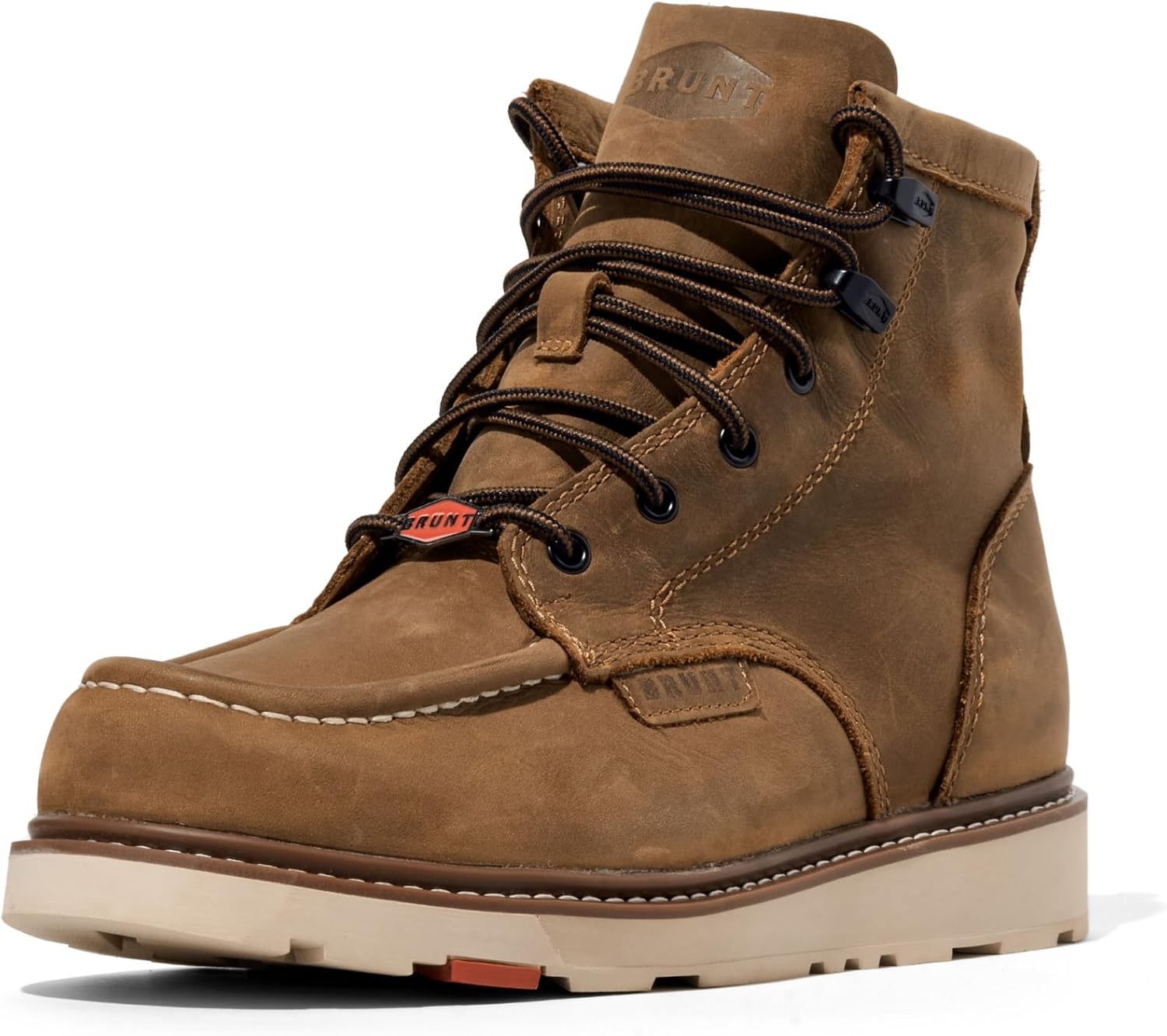 Brown leather work boot on a construction site